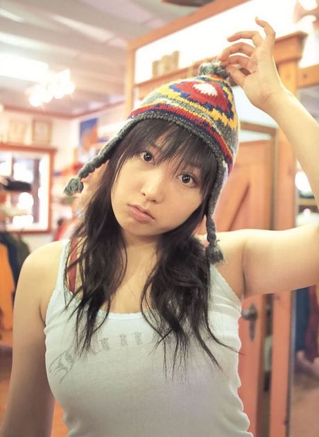 Busty asian babe with big round voluptuous boobs in a bikini