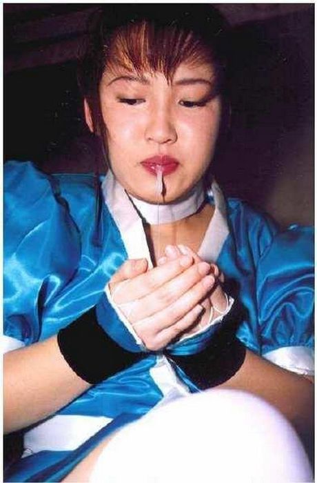 Petite Asian girl with small tits and a sexy booty strips and bares all