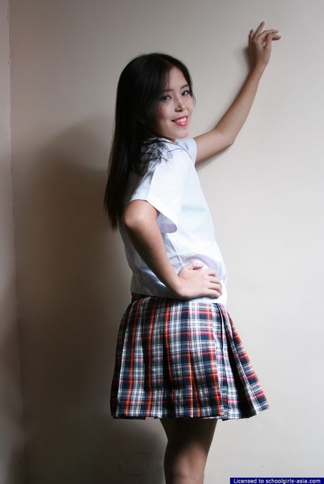 Shy white skinned schoolgirl flashing tight her hairy muff