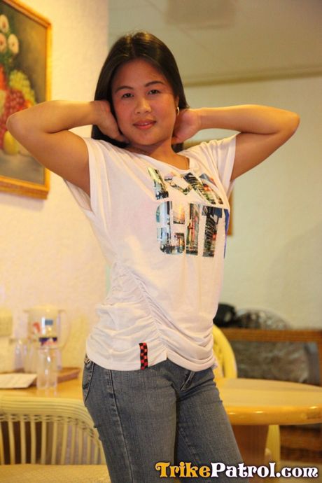 Asian teen Anne strips and shows her tiny tits and hot ass in a solo