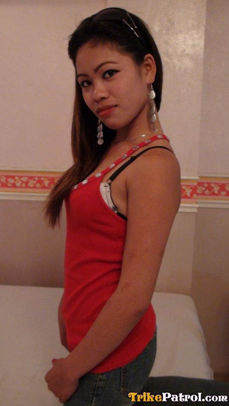 Asian teen Corina strips and shows her small tits and hot ass