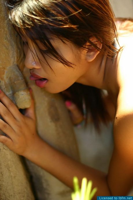 Asian amateur babe strips off and unveils her tiny tits and pussy