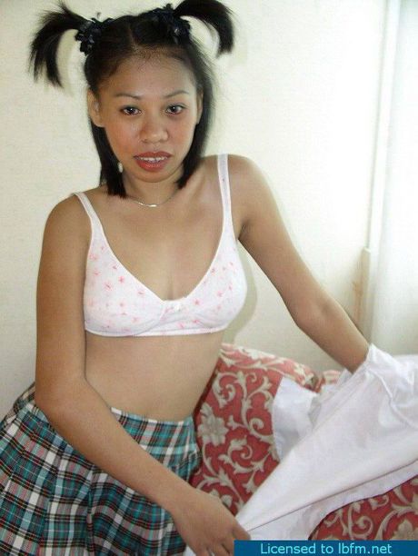 Asian schoolgirl amateur strips off and unveils her tiny tits and ass