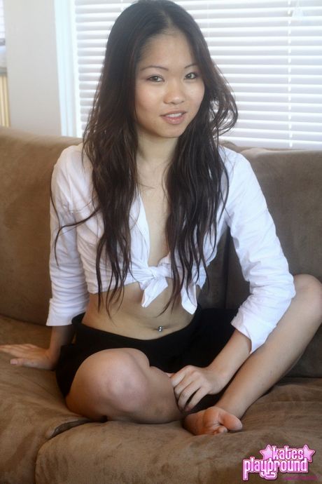 Asian schoolgirl Grace strips and shows her amazing boobs and ass in a solo