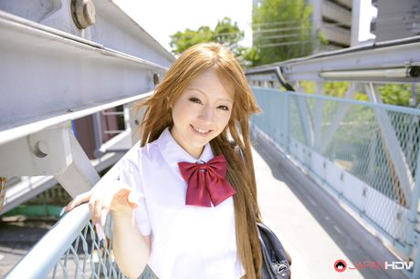Wonderful Japanese schoolgirl Ria Sakurai shows off outdoors