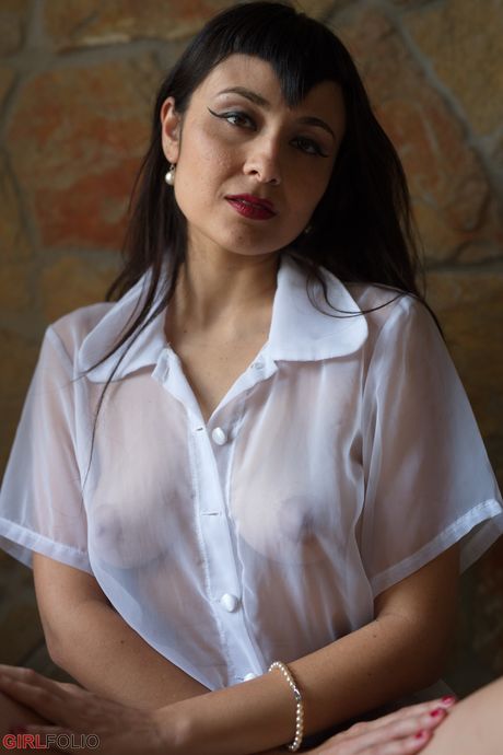 Asian babe Sophia Jade presents her amazing racks and ass in a solo