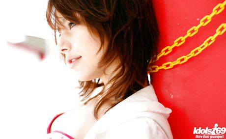 Stunning japanese teen Rio uncovers small tits and hot ass